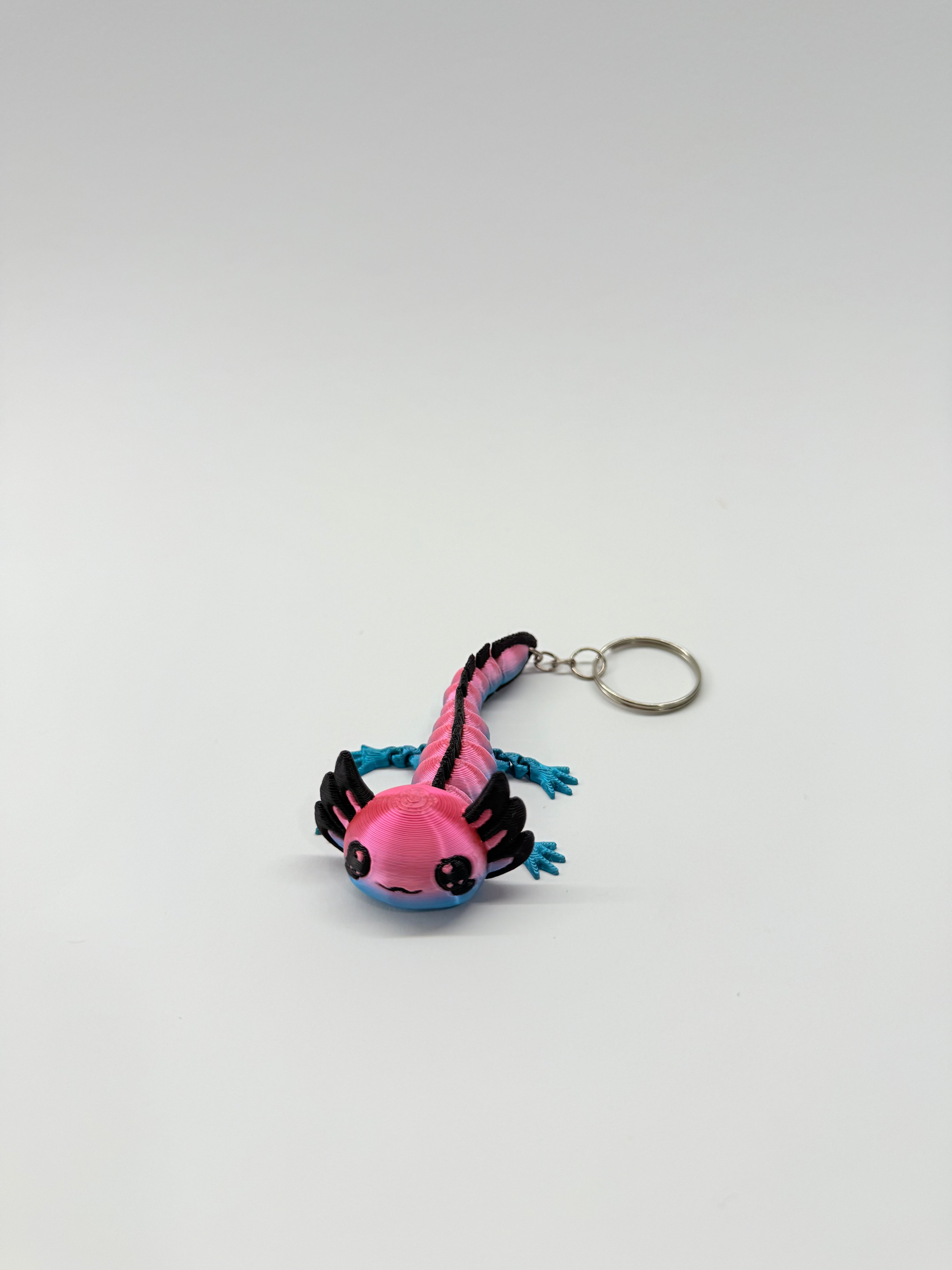 Flexi axolotl keychain
