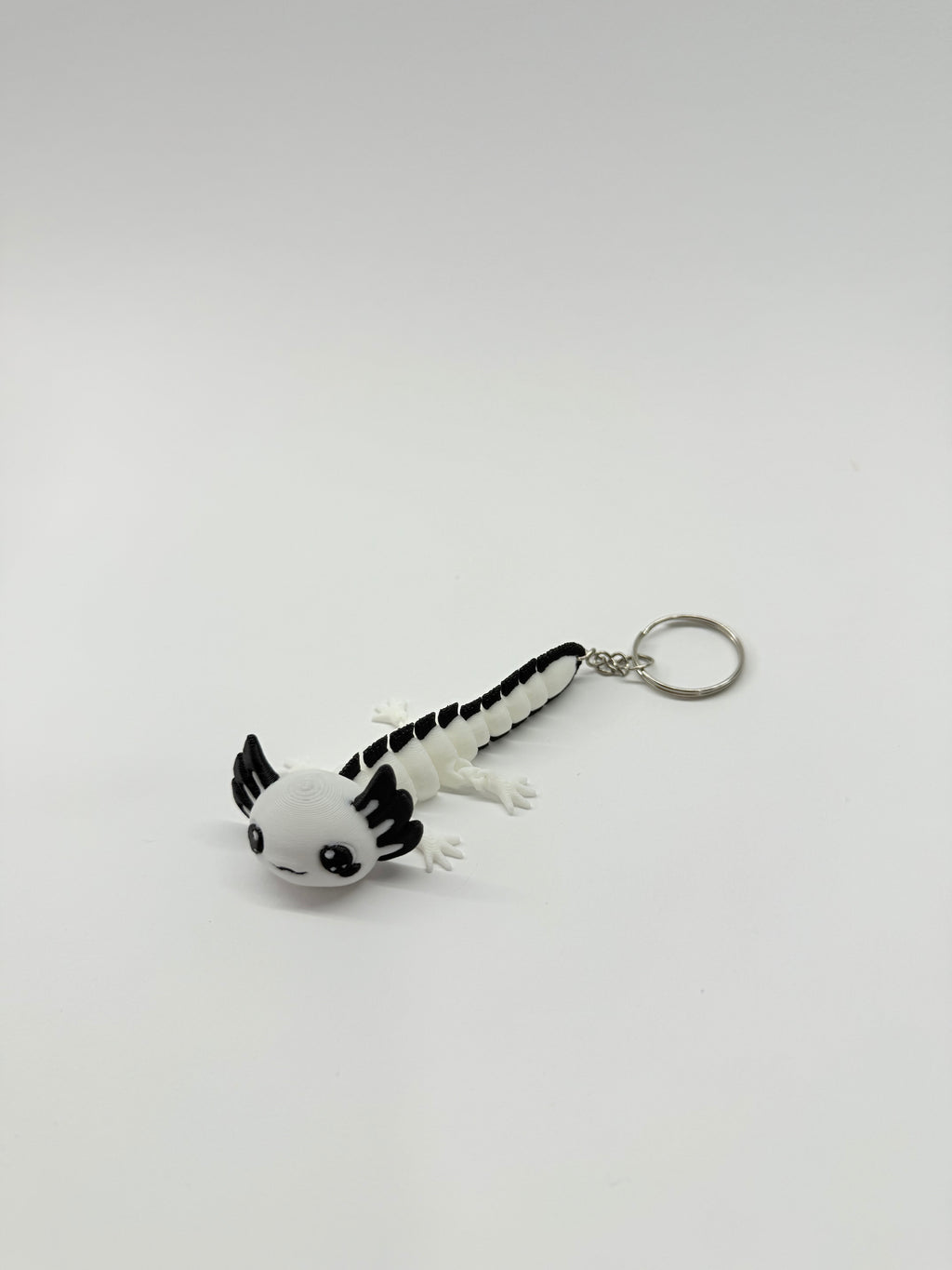 Flexi axolotl keychain
